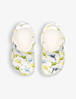 CROCS: Classic dinosaur-print rubber clogs