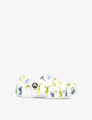 CROCS: Classic dinosaur-print rubber clogs