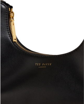 Shop Ted Baker Women's Black Kaelyin Stud-embellished Logo-embossed Leather Baguette Bag