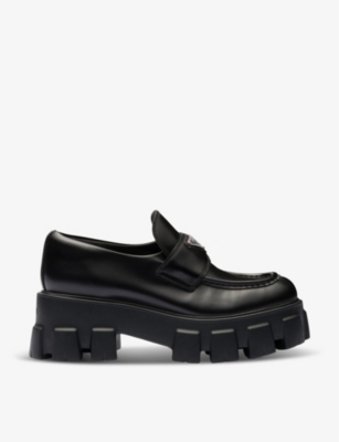 Shop Prada Monolith Logo-plaque Leather Loafers In Black