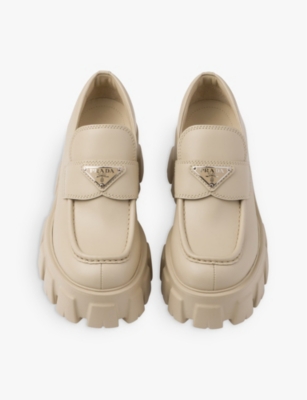 PRADA: Monolith logo-plaque leather loafers