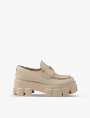 PRADA: Monolith logo-plaque leather loafers