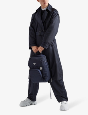 Prada Structured Leather Backpack With Logo Zipper Closure In Blue