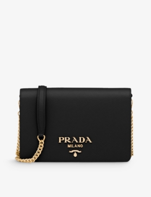 PRADA Brand plaque mini Saffiano leather cross body bag Selfridges