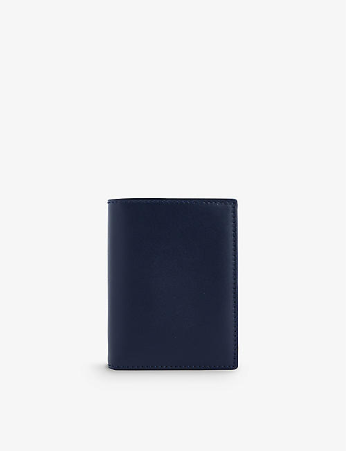 COMME DES GARCONS: Brand-embossed bi-fold leather wallet