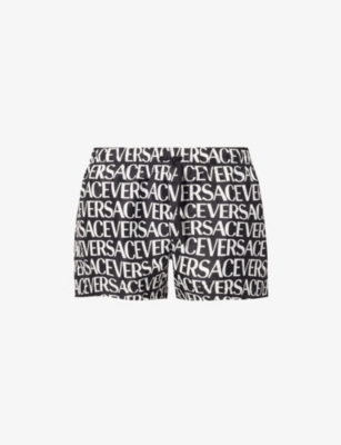 VERSACE: Brand-print slip-pocket swim shorts