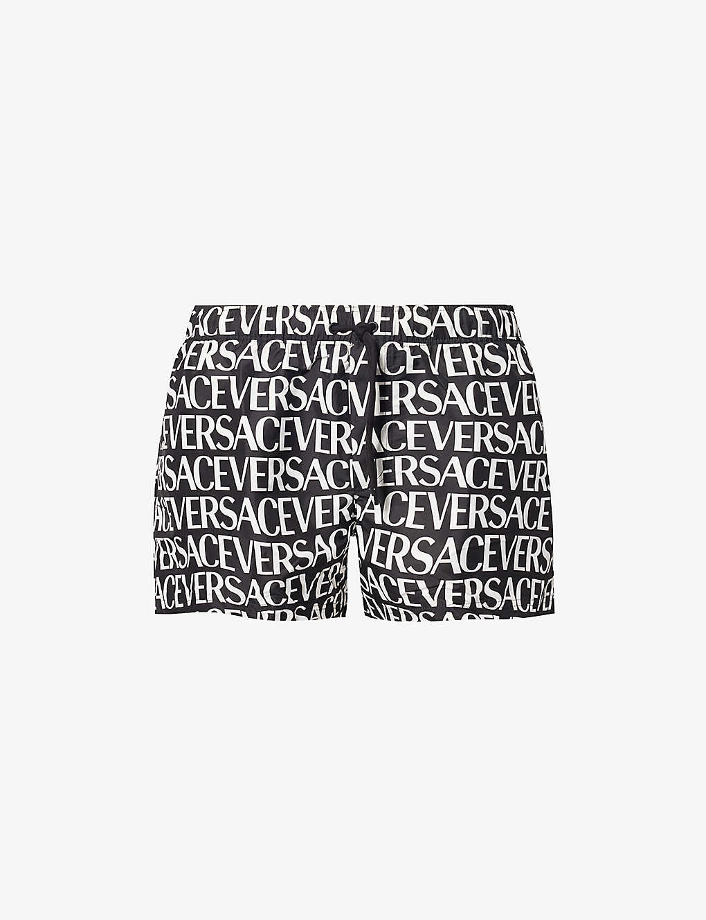 Shop Versace Men's Black+white Brand-print Slip-pocket Swim Shorts In Monochrome