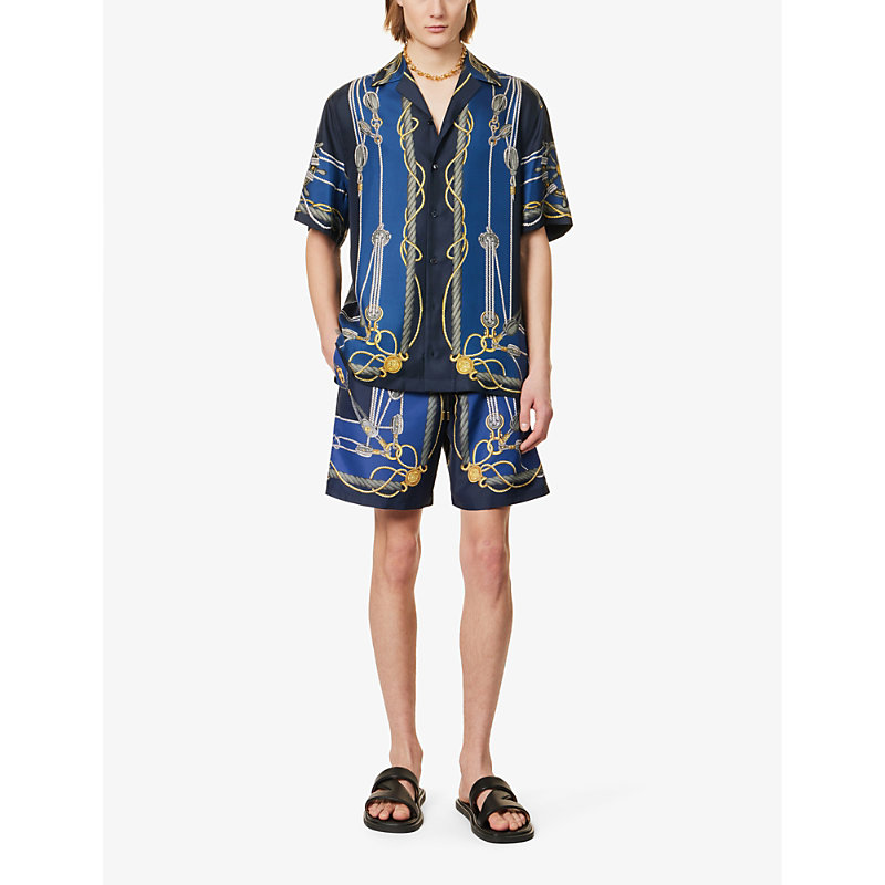 Shop Versace Men's Blue+gold Brand-print Slip-pocket Swim Shorts