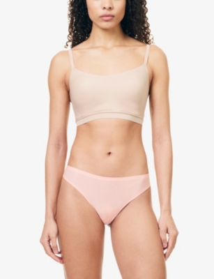 Shop Chantelle Soft Stretch Mid-rise Stretch-woven Thong In Candlelight Peach