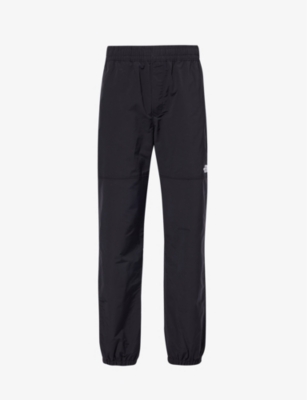 Shop The North Face Men's Black Easy Wind Brand-embroidered Shell Trousers