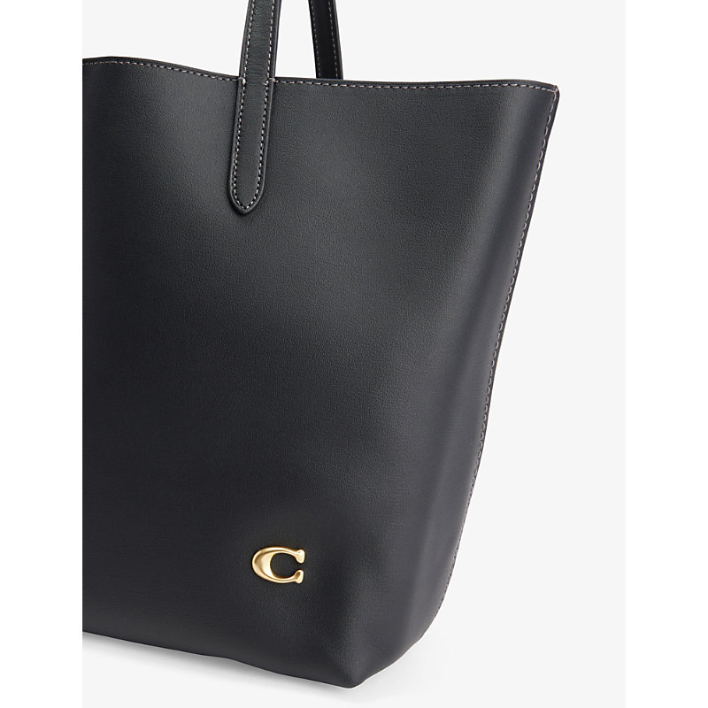 Shop Coach Women's B4/black Nomad 32 Branded-plaque Leather Tote Bag