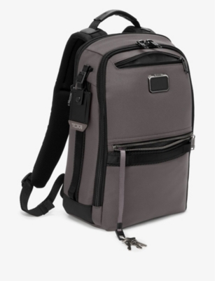 TUMI: Dynamic multi-pocket shell backpack