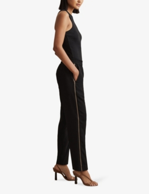 Shop Reiss Women's Black Remi Tapered-leg High-rise Woven Trousers