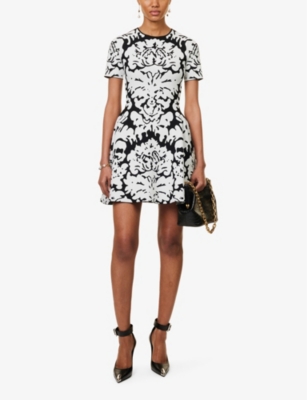 Shop Alexander Mcqueen Women's Black White Floral-pattern Cut-out-back Stretch-knit Mini Dress