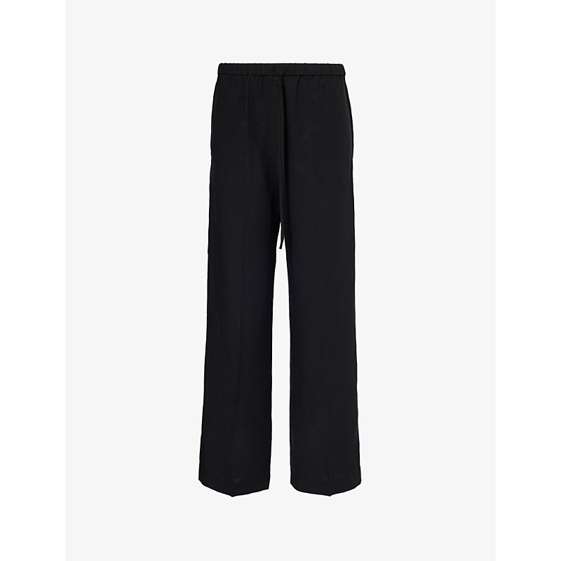 Shop Totême Wide-leg Relaxed-fit Woven Trousers In Black