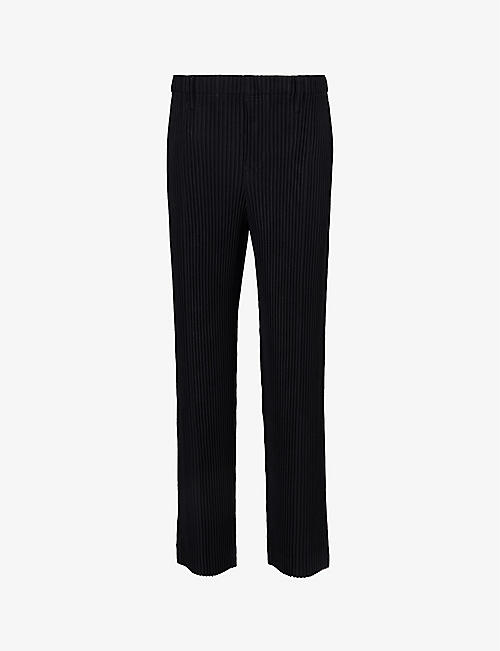 HOMME PLISSE ISSEY MIYAKE: Pleated elasticated-waistband tapered-leg regular-fit knitted trousers
