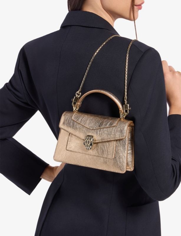 Serpenti Forever mini stud-embellished leather top-handle bag