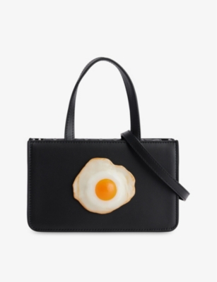 Shop Puppets And Puppets Black Egg-appliqué Small Leather Top-handle Bag