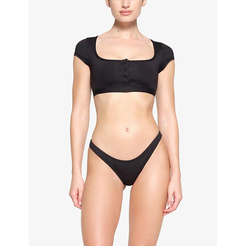Shop Skims Women's Onyx Signature Swim Round-neck Cropped Stretch Recycled-nylon Bikini Top
