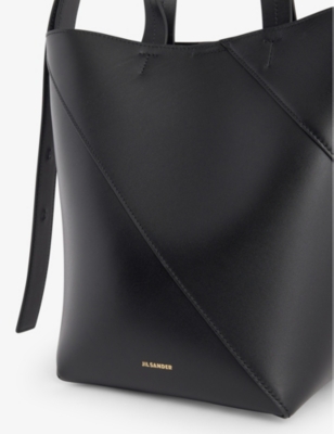 Shop Jil Sander Vertigo Leather Cross-body Bag In Black