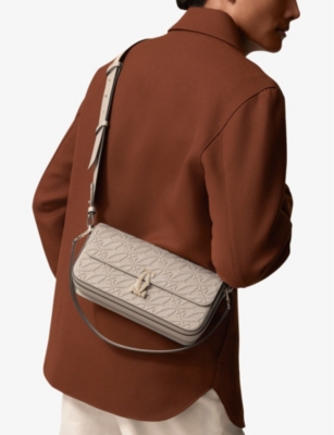 Shop Cartier Women's Beige C De Leather Cross-body Bag