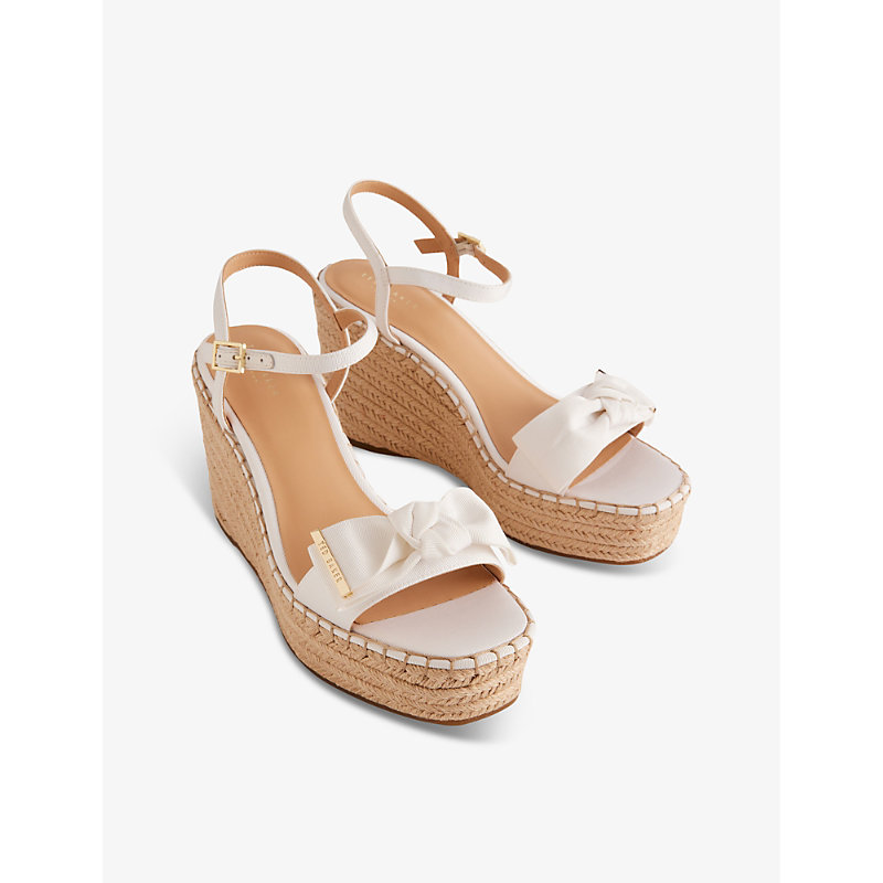 Shop Ted Baker Geiia Bow-embellished Woven Wedge Sandals In White