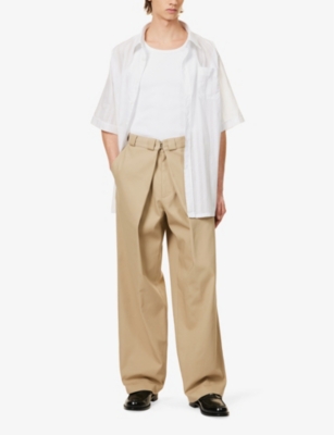 Shop Givenchy Men's Beige Pleated Slip-pocket Mid-rise Wide-leg Woven Trousers