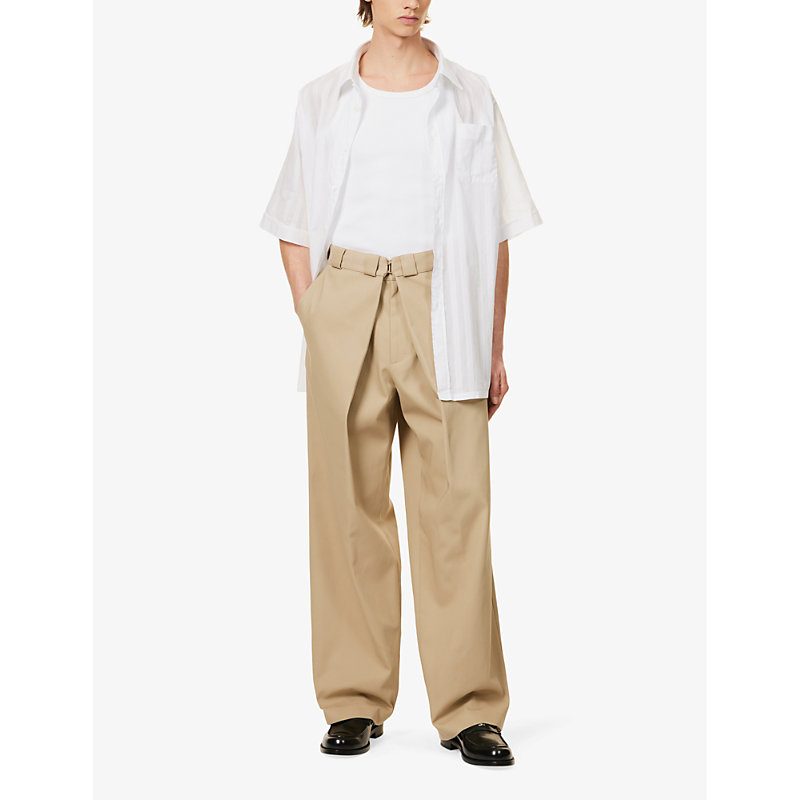 Shop Givenchy Pleated Slip-pocket Mid-rise Wide-leg Woven Trousers In Beige