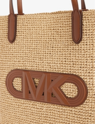 Shop Michael Michael Kors Xl Brand-appliquéd Straw Tote Bag In Nat/lugg