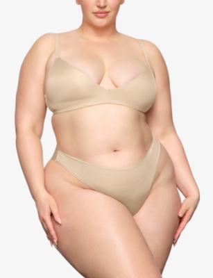 Skims Womens Sand Wireless Form Logo-embossed Padded Stretch-cotton Bra In Sand