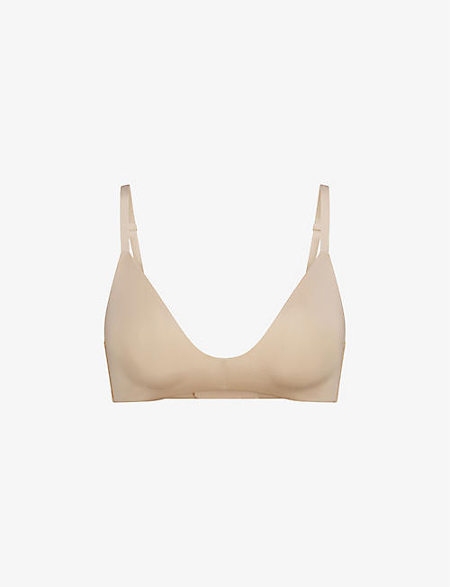 SKIMS: Wireless Form logo-embossed padded stretch-cotton bra