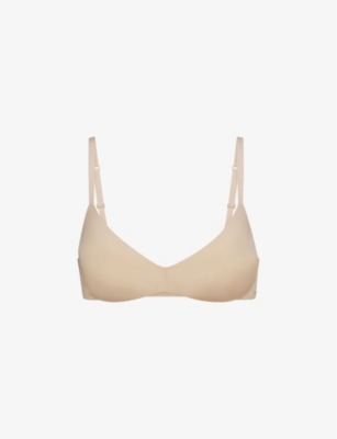 SKIMS: Wireless Form logo-embossed plunge stretch-cotton bra