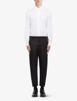 PRADA: Brand-plaque drawstring-hem skinny-fit slim-leg Re-Nylon trousers