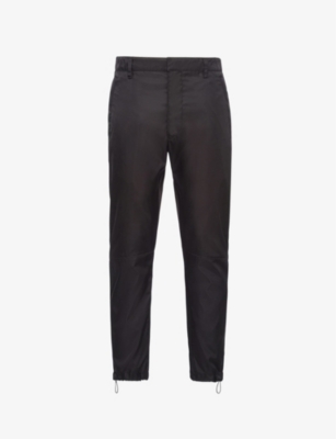 Prada Brand-plaque Drawstring-hem Skinny-fit Slim-leg Re-nylon Trousers In Black