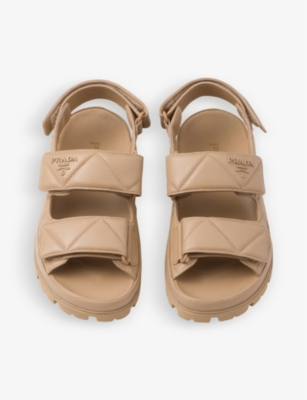 PRADA: Logo-pattern padded leather sandals