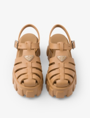 Shop Prada Monolith Logo-plaque Chunky-sole Caged Rubber Sandals In Yellow