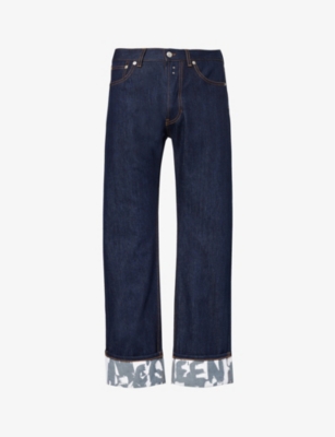 Shop Alexander Mcqueen Turn-up Folded-hem Regular-fit Jeans In Indigo