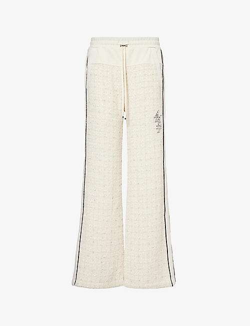 AMIRI: Bouclé-panel brand-embroidered woven trousers