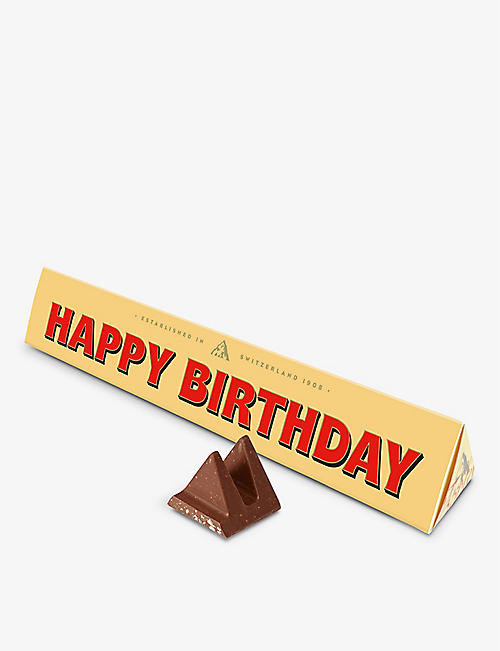 TOBLERONE: Toblerone Happy Birthday milk chocolate and nougat bar 100g