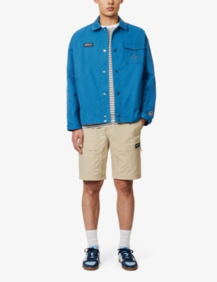 Shop Adidas Statement Men's Savanh Rossendale Brand-appliqué Woven Shorts In Savannah