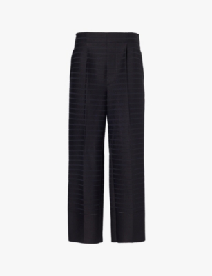 ISSEY MIYAKE: Ribbed straight-leg high-rise knitted trousers