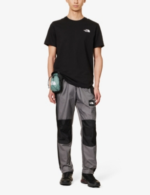 Shop The North Face Men's Smoked Pearl/black Wind Brand-patch Straight-leg Mid-rise Shell Trousers