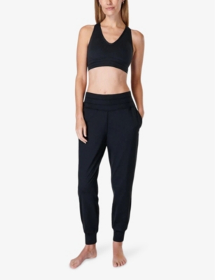 Shop Sweaty Betty Womens Black Gaia 27 Stretch Recycled-polyester Jogging Bottoms