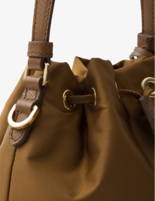 Shop Prada Re-edition 1978 Re-nylon Mini Recycled-polyamide Bucket Bag In Brown