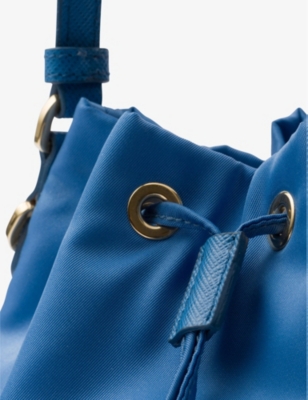 Shop Prada Re-edition 1978 Re-nylon Mini Recycled-polyamide Bucket Bag In Light Blue