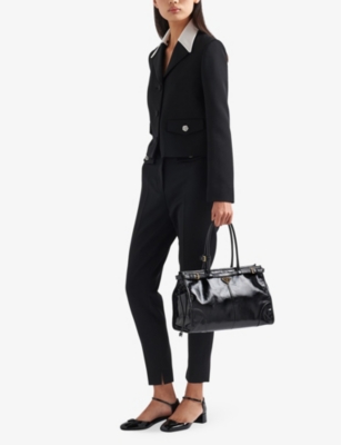 Shop Prada Logo-plaque Large Leather Top-handle Bag In Black