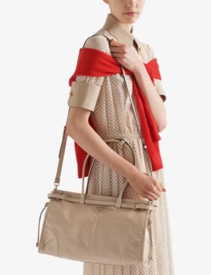 Prada Large Enamel Triangle Logo Belted Handbag In Neutral