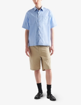 Shop Prada Logo-embellished Oversized-fit Stretch-cotton Shirt In Light Blue