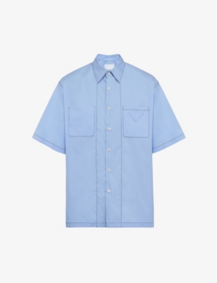 Prada Logo-embellished Oversized-fit Stretch-cotton Shirt In Light Blue