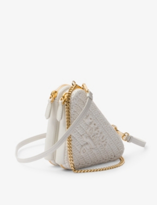 Shop Prada Triangle-shaped Woven Cross-body Bag In White